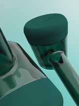 Close-up detail of Vessel Forge Emerald glass pipe surface and finish