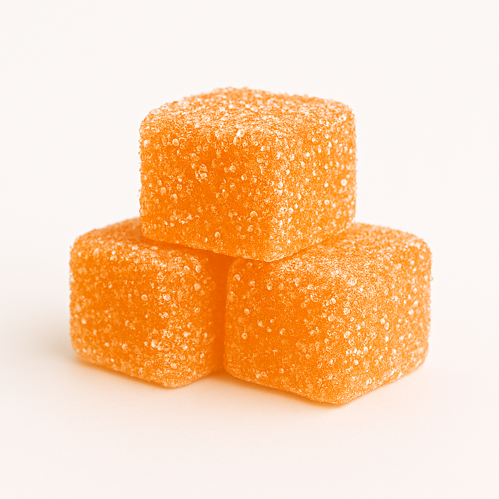 Frosty Orange Cream sativa gummies stacked closeup
