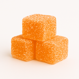 Frosty Orange Cream sativa gummies stacked closeup