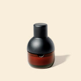 NWTN Beacon Ashtray in Baltic Amber with lighter and wick holder lid